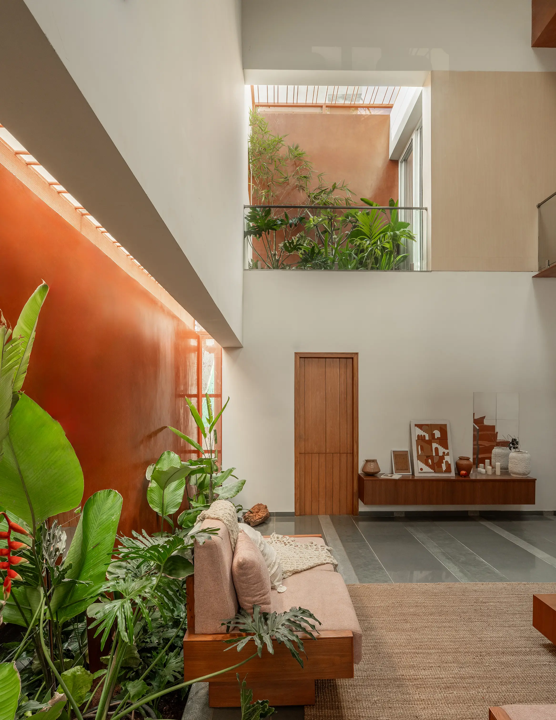 Splitscape Residence courtyard and living room