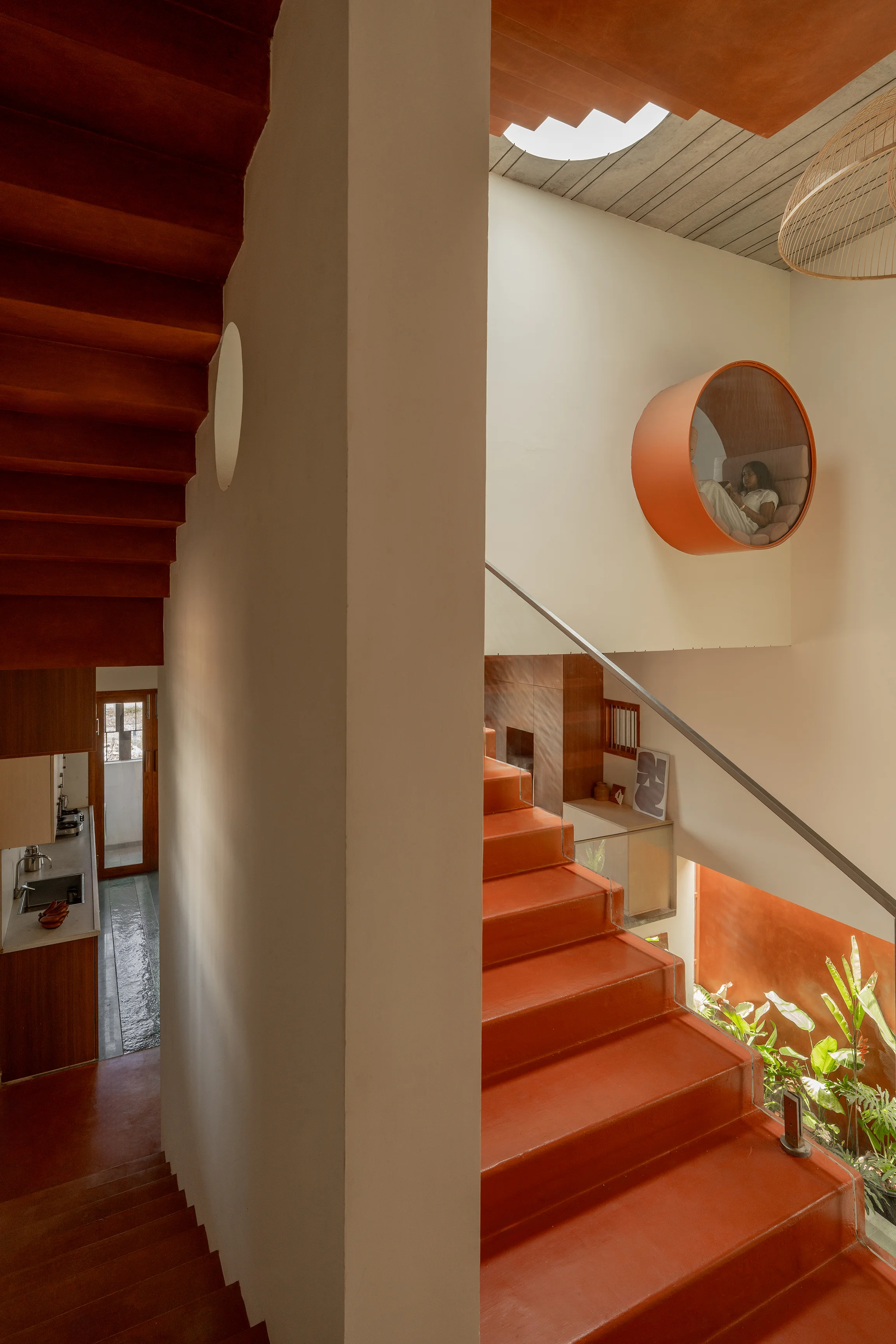 Splitscape Residence staircase with bay window